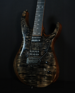 Brown Striped / Natural Figured Top Guitar Closeup with black hardware and black humbuckers.